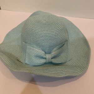 Light blue Simply Noelle sun hat with bow